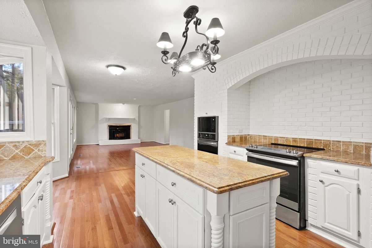 Chandelier, Fireplace, Interior, Kitchen, Wood Texture Flooring