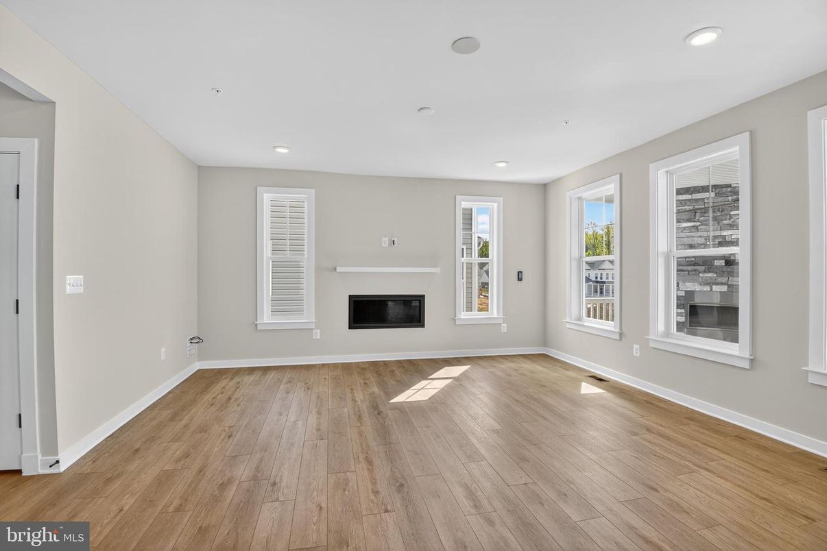 Empty room, Fireplace, Interior, Recessed Lighting, Wood Texture Flooring