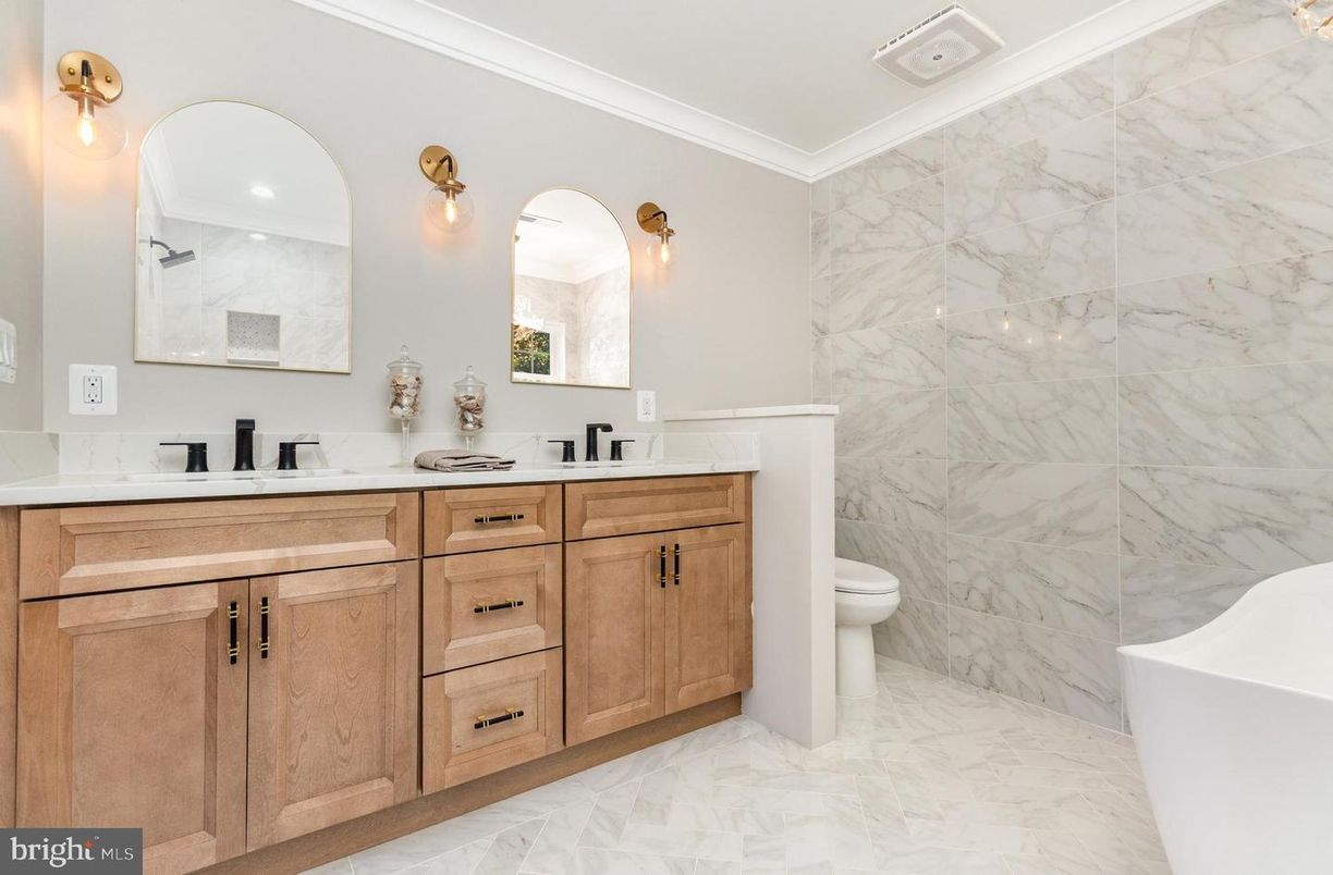 Bathroom, Dual Sink Vanities, Free Standing Baths, Interior, Marble, Marble Walls, Recessed Lighting