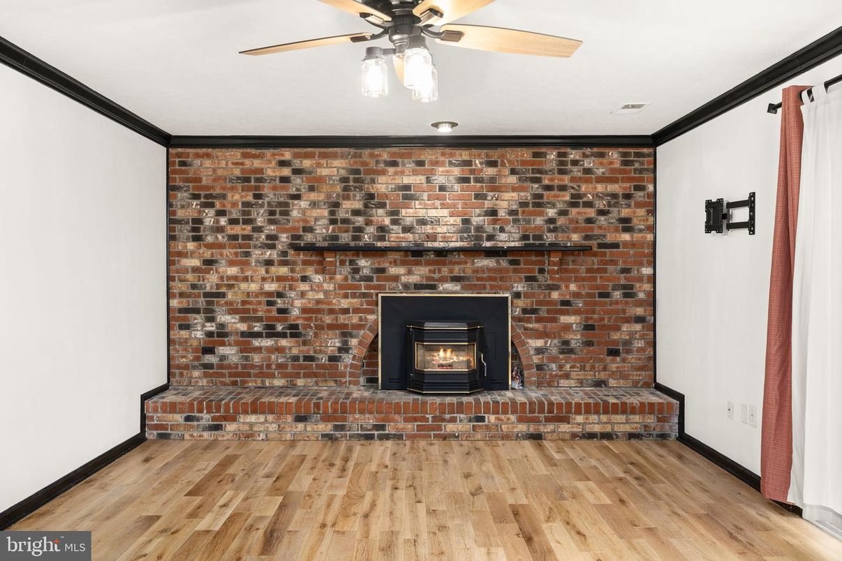 Empty room, Fireplace, Interior, Stone Walls, Wood Texture Flooring