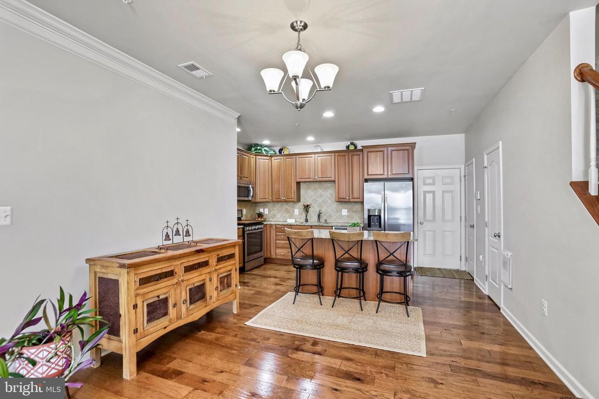Chandelier, Interior, Kitchen, Pendant Lights, Recessed Lighting, Stainless Steel Appliances, Wood Texture Flooring