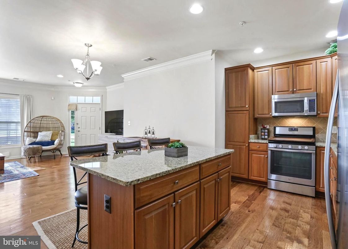 Chandelier, Interior, Kitchen, Recessed Lighting, Stainless Steel Appliances, Wood Texture Flooring