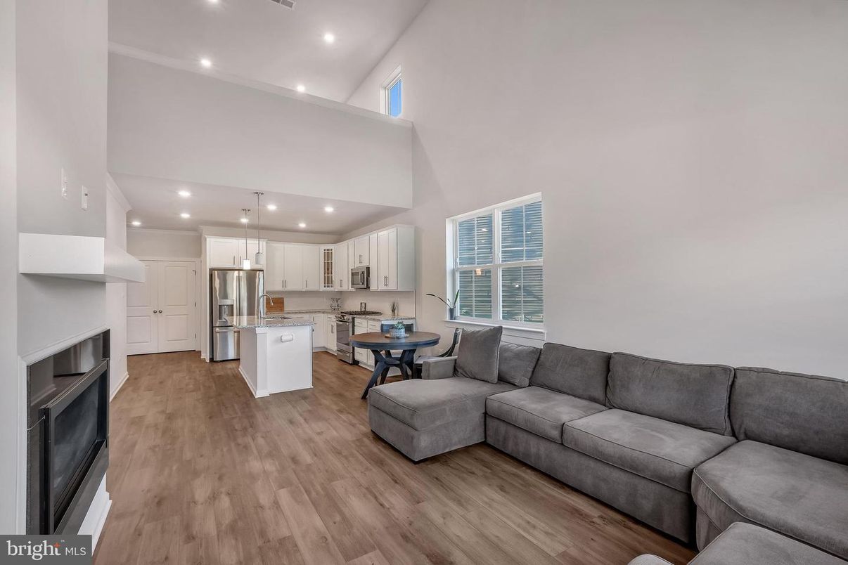 Dining room, Fireplace, Interior, Kitchen, Living room, Pendant Lights, Recessed Lighting, Wood Texture Flooring