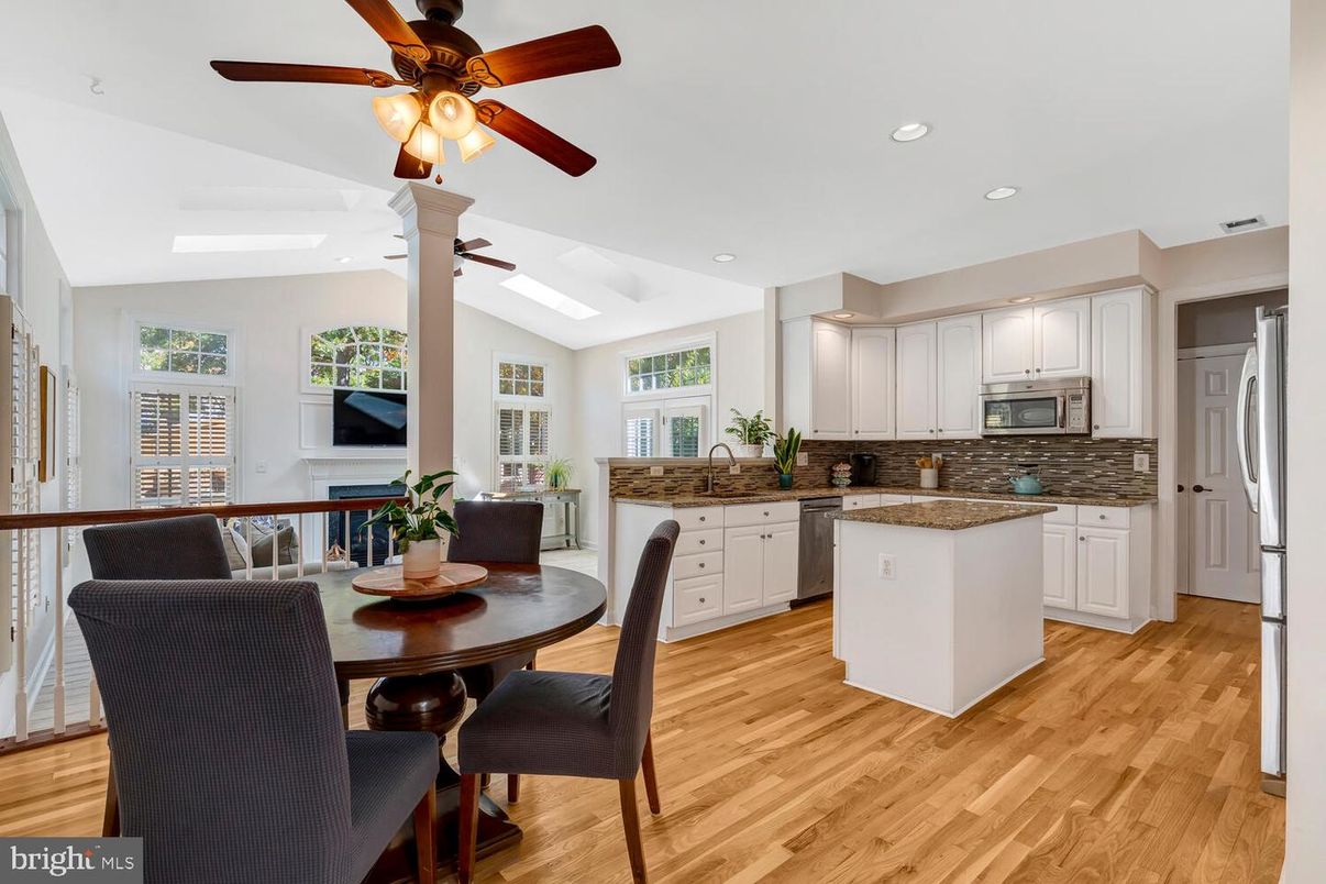 Dining room, Interior, Kitchen, Recessed Lighting, Stainless Steel Appliances, Wood Texture Flooring