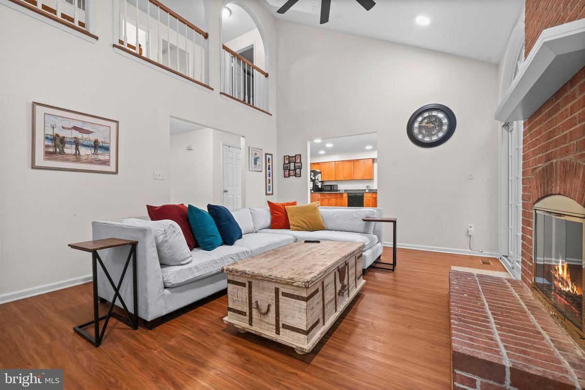 Fireplace, Interior, Kitchen, Living room, Recessed Lighting, Stone Walls, Wood Texture Flooring