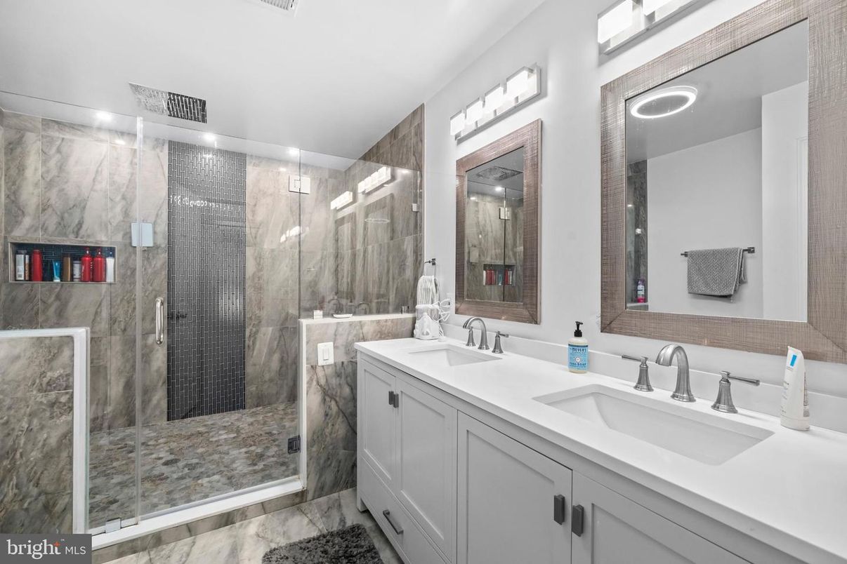 Bathroom, Dual Sink Vanities, Glass Shower, Interior, Marble, Marble Walls, Recessed Lighting
