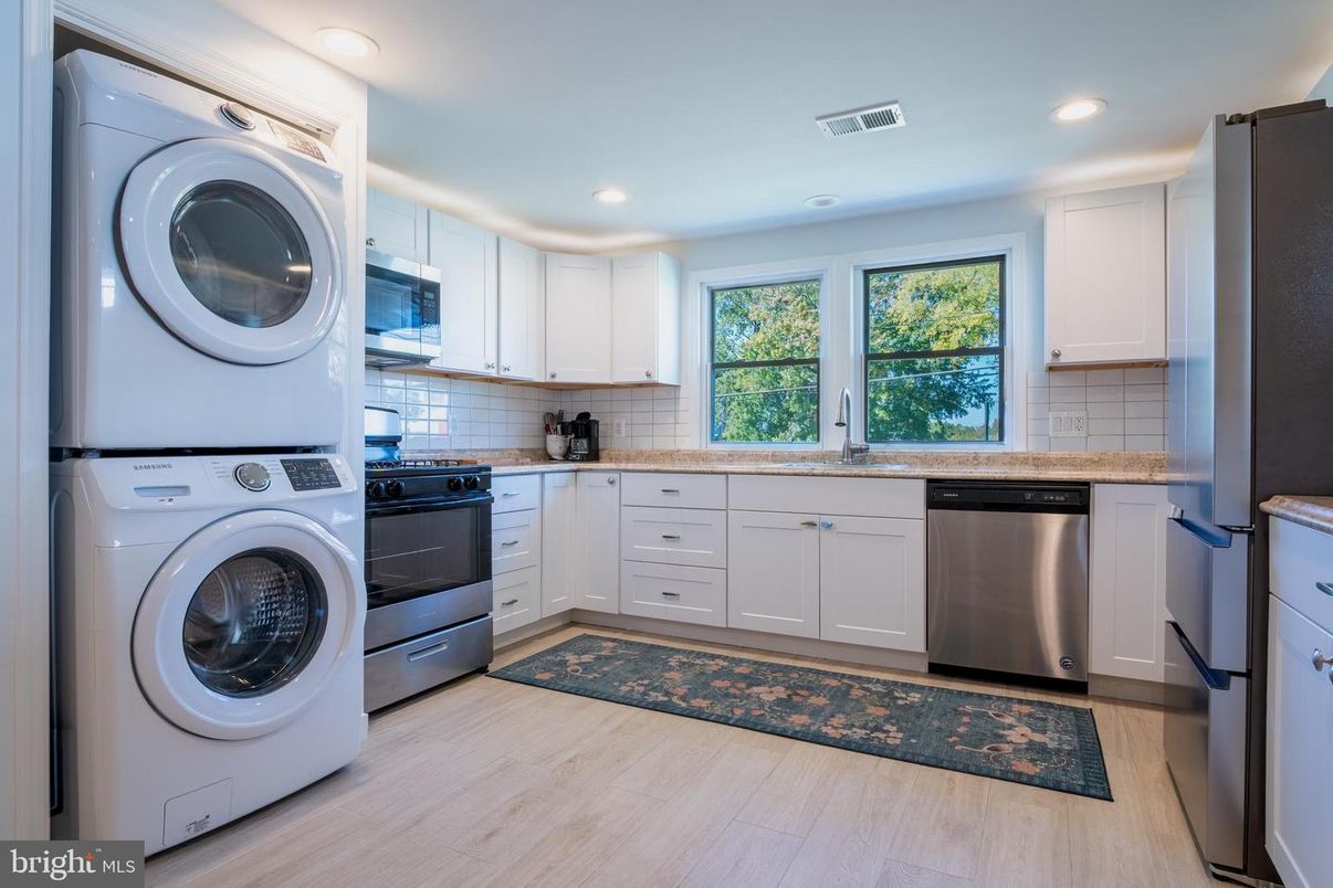 Interior, Kitchen, Recessed Lighting, Stainless Steel Appliances, Washer, Wood Texture Flooring