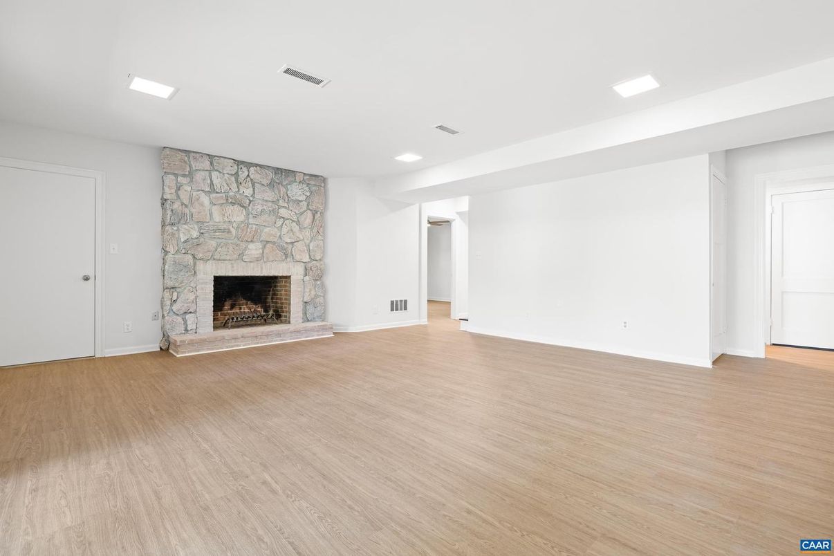 Empty room, Fireplace, Interior, Recessed Lighting, Wood Texture Flooring