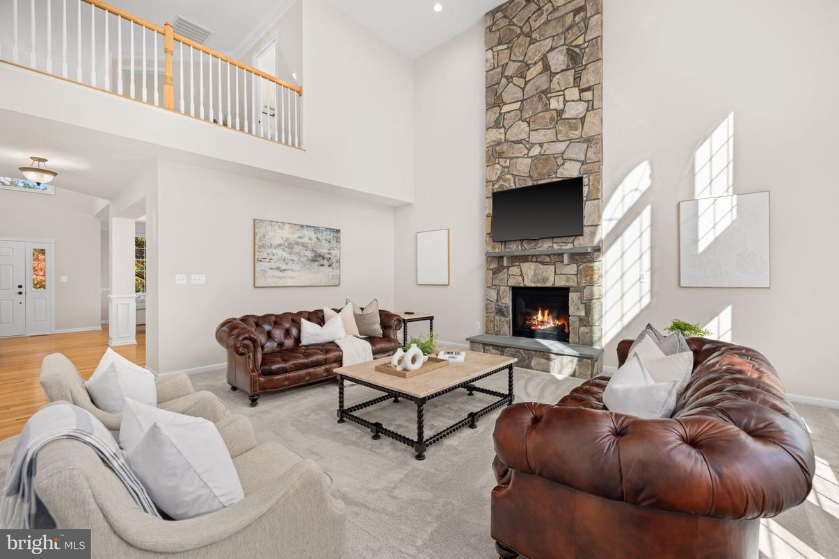 Fireplace, Interior, Living room, Recessed Lighting, Stone Walls, Wood Texture Flooring