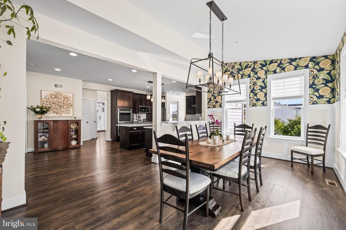 Dining room, Interior, Kitchen, Pendant Lights, Recessed Lighting, Stainless Steel Appliances, Wood Texture Flooring