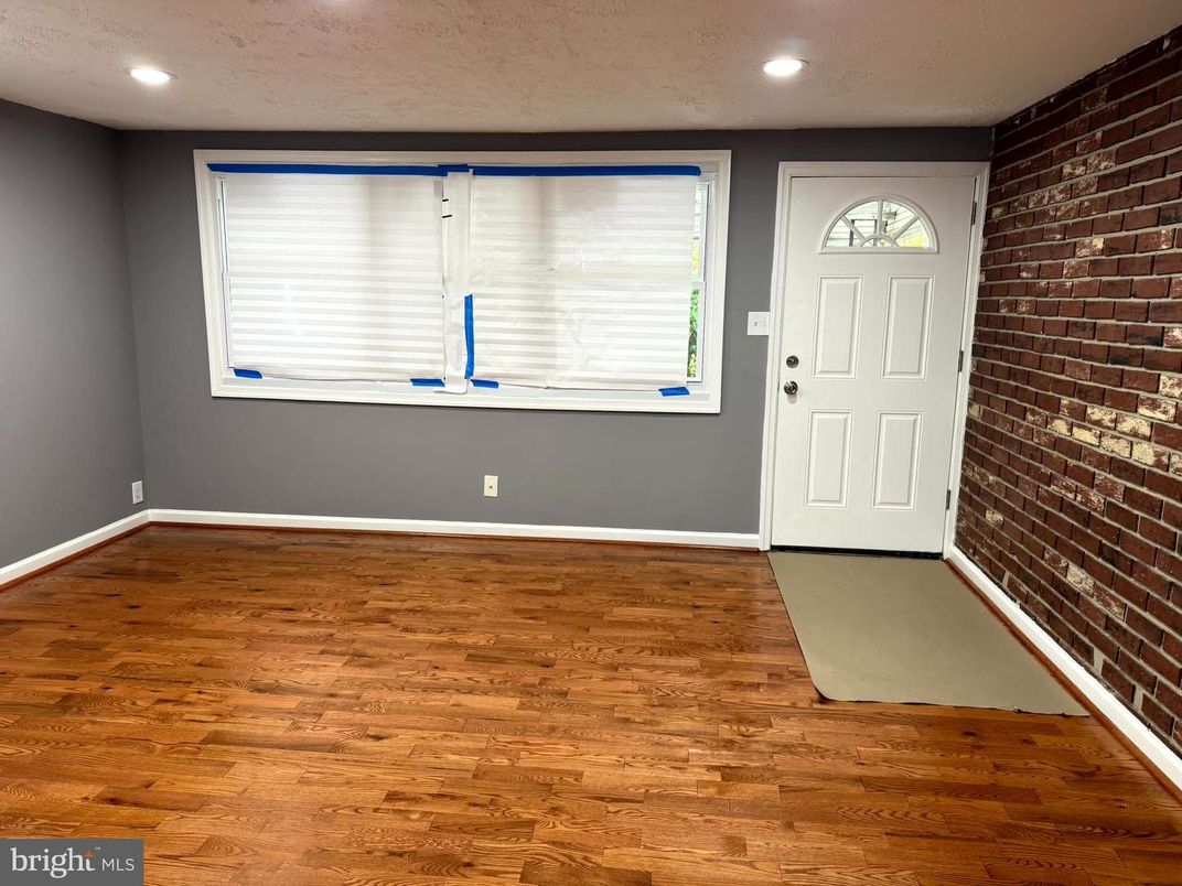 Empty room, Interior, Recessed Lighting, Stone Walls, Wood Texture Flooring