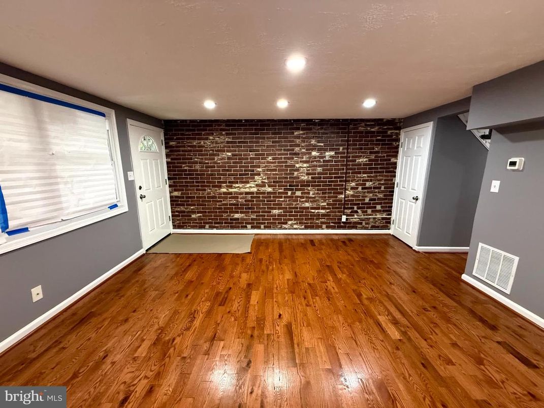 Empty room, Interior, Recessed Lighting, Stone Walls, Wood Texture Flooring