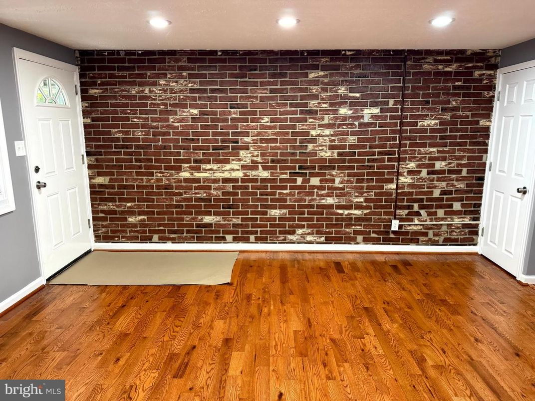 Empty room, Interior, Recessed Lighting, Stone Walls, Wood Texture Flooring