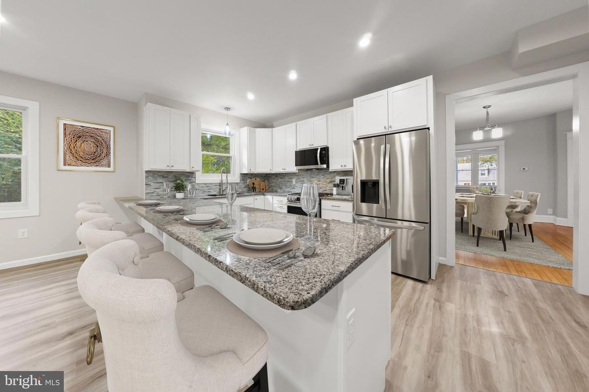 Dining room, Interior, Kitchen, Pendant Lights, Recessed Lighting, Stainless Steel Appliances, Wood Texture Flooring