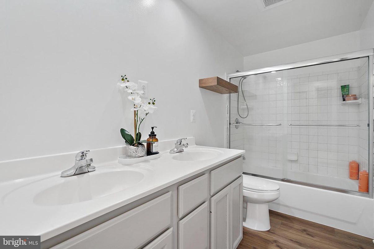 Bathroom, Dual Sink Vanities, Glass Shower, Interior, Wood Texture Flooring