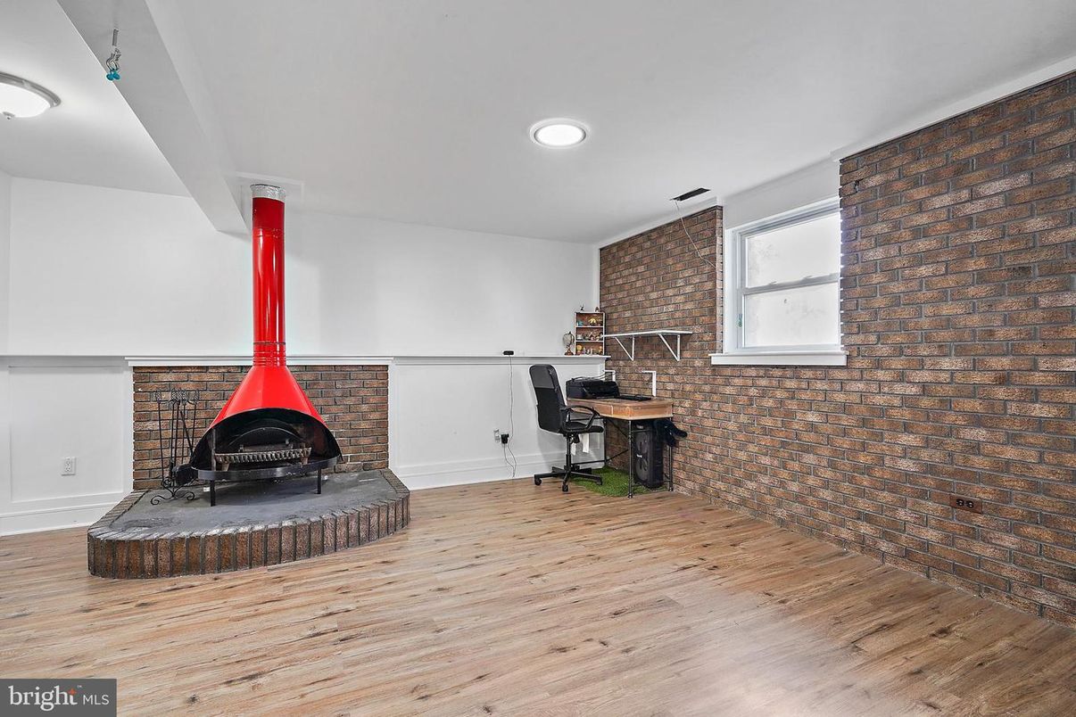 Fireplace, Interior, Recessed Lighting, Stone Walls, Wood Texture Flooring