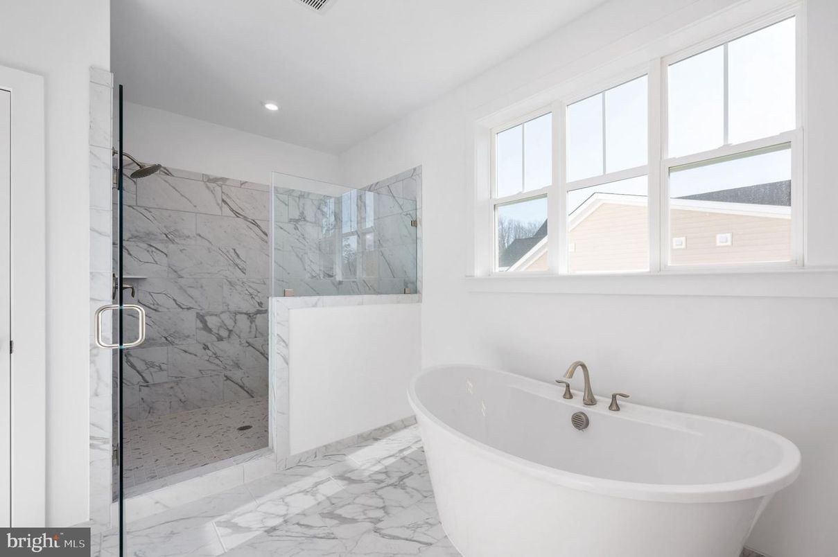 Bathroom, Free Standing Baths, Glass Shower, Interior, Marble, Marble Walls, Recessed Lighting