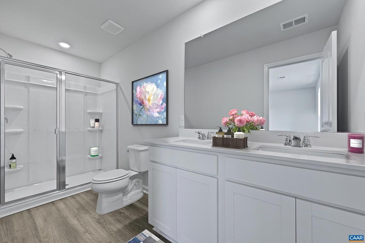 Bathroom, Dual Sink Vanities, Glass Shower, Interior, Recessed Lighting, Wood Texture Flooring