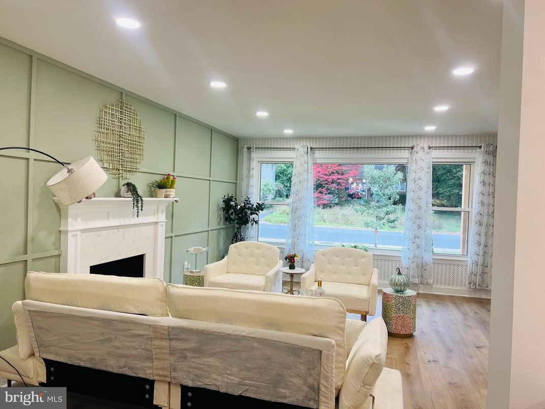 Fireplace, Interior, Living room, Recessed Lighting, Water, Wood Texture Flooring