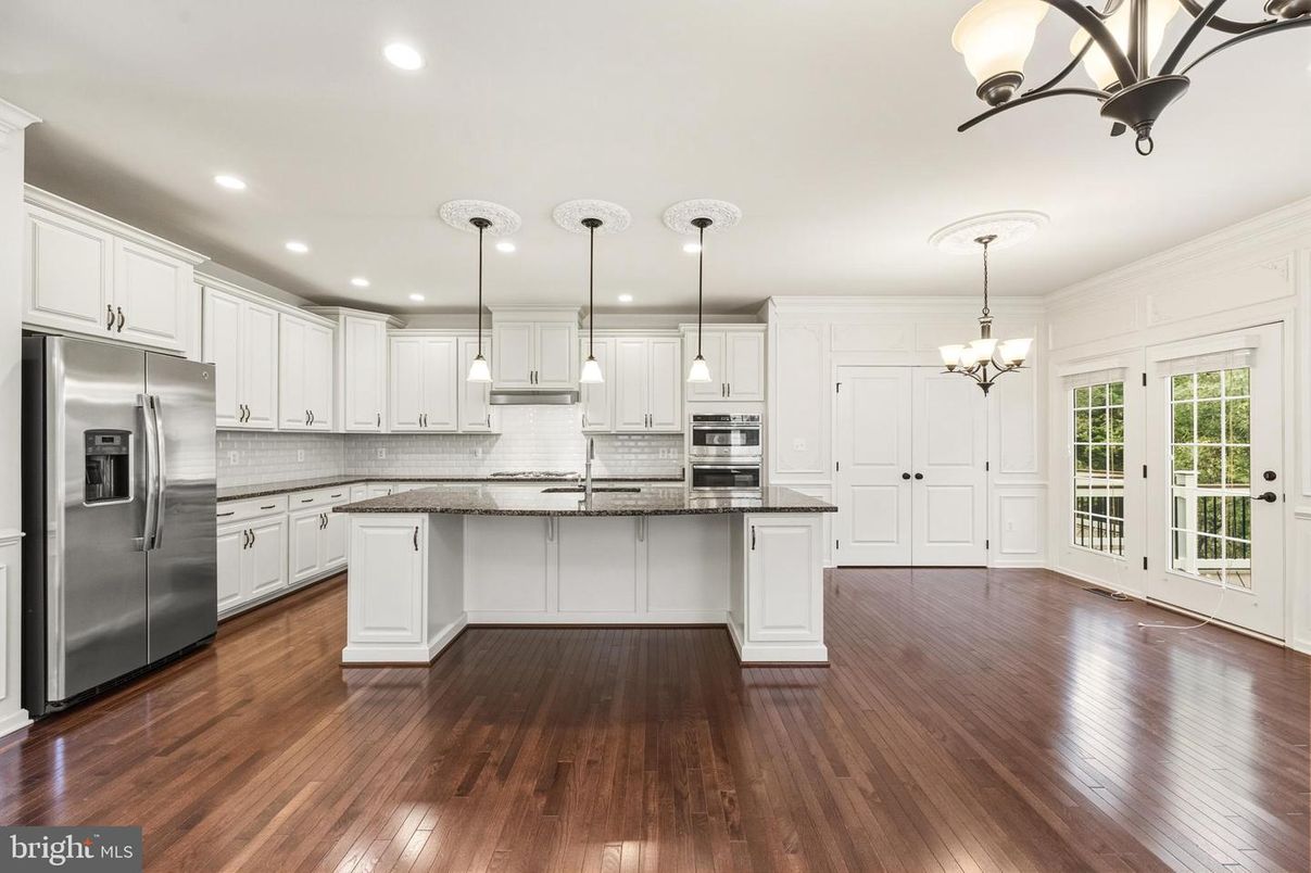 Chandelier, Interior, Kitchen, Pendant Lights, Recessed Lighting, Stainless Steel Appliances, Wood Texture Flooring