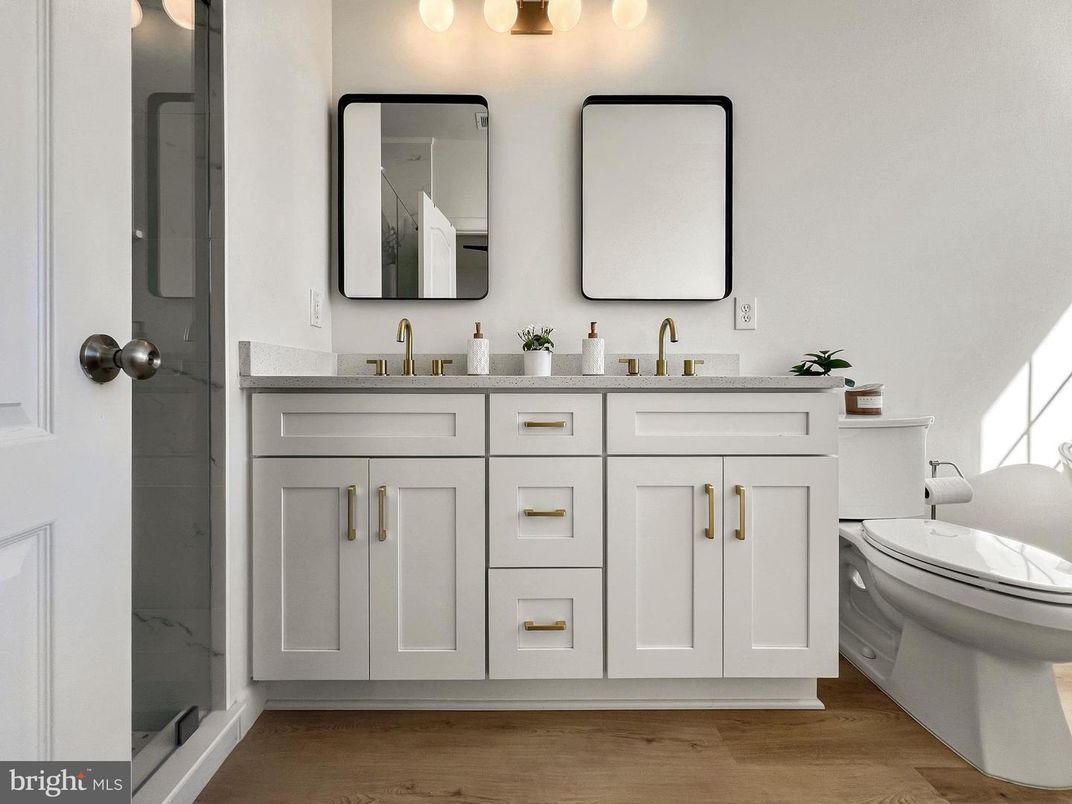 Bathroom, Dual Sink Vanities, Glass Shower, Interior, Wood Texture Flooring