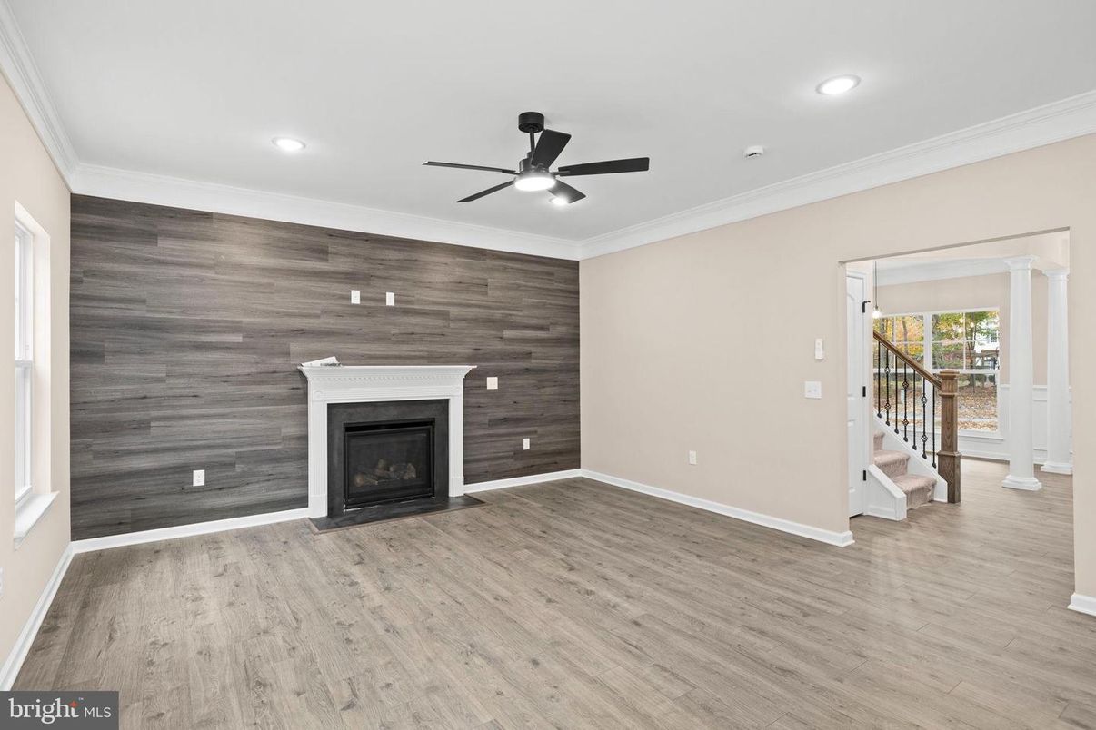 Empty room, Fireplace, Interior, Recessed Lighting, Wood Texture Flooring, Wooden Walls