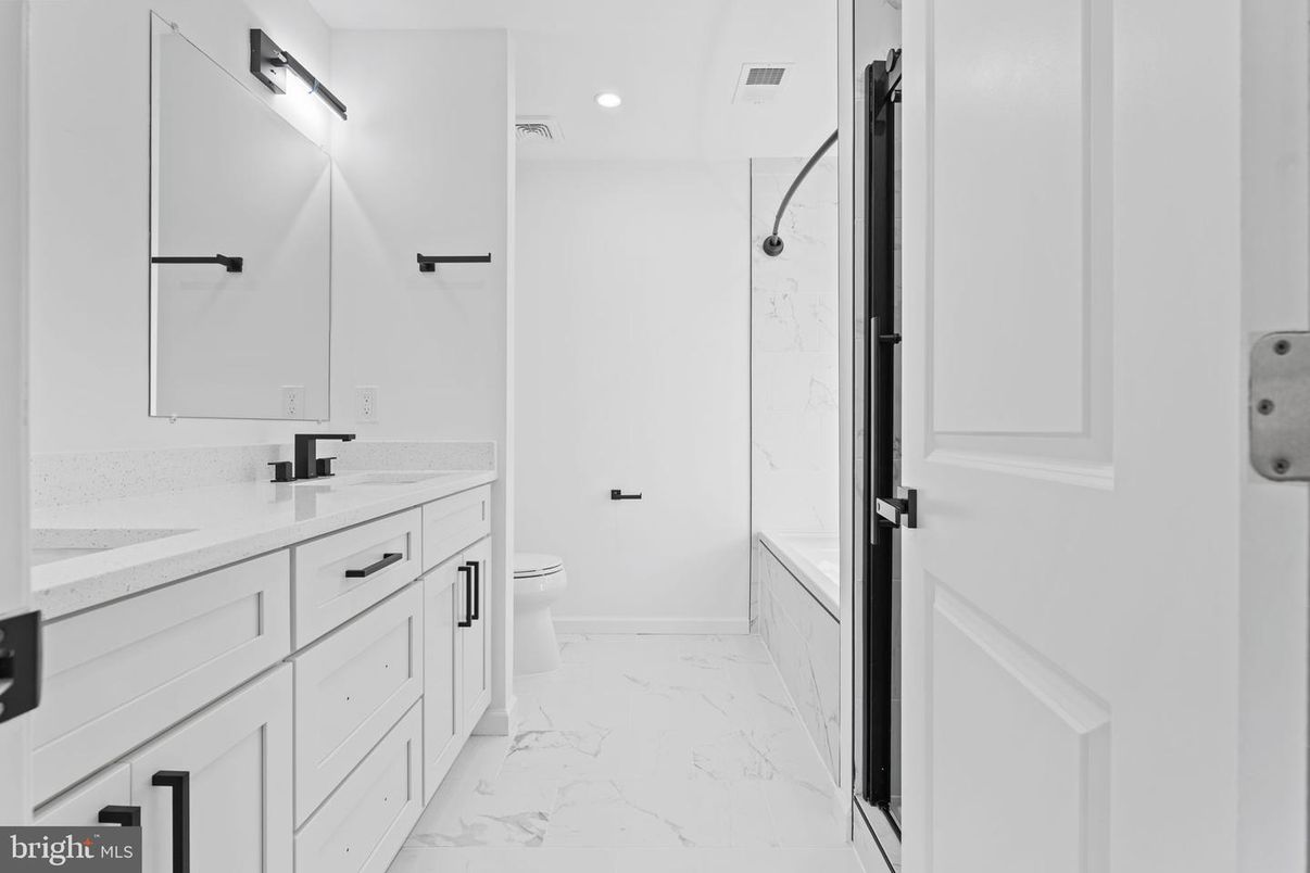 Bathroom, Dual Sink Vanities, Glass Shower, Interior, Marble, Recessed Lighting