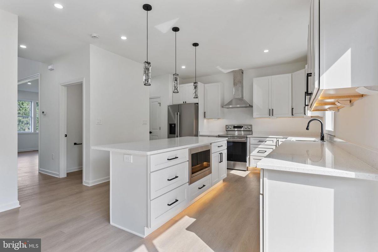 Interior, Kitchen, Pendant Lights, Recessed Lighting, Stainless Steel Appliances, Wood Texture Flooring