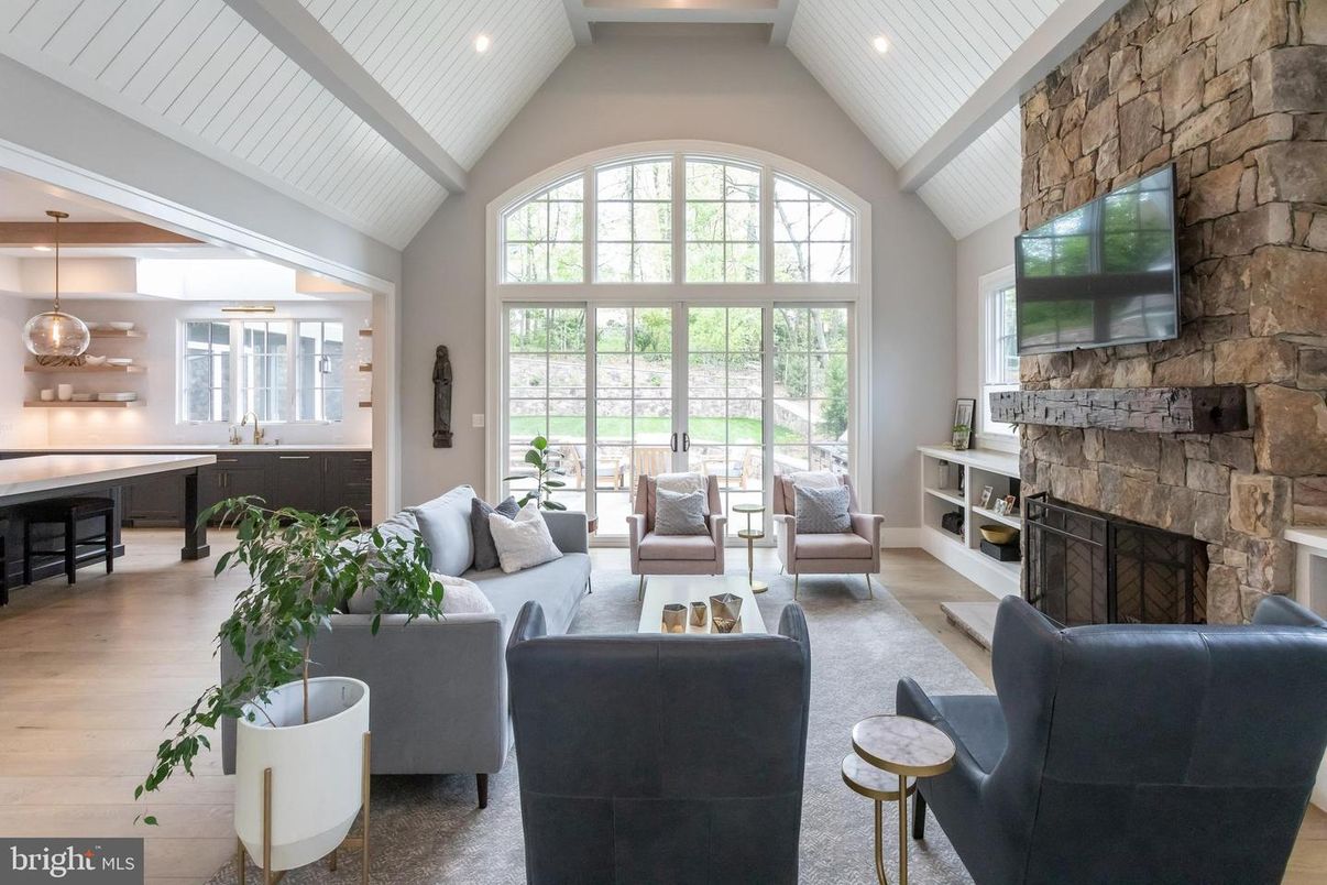 Fireplace, Interior, Living room, Pendant Lights, Recessed Lighting, Stone Walls, Wood Texture Flooring