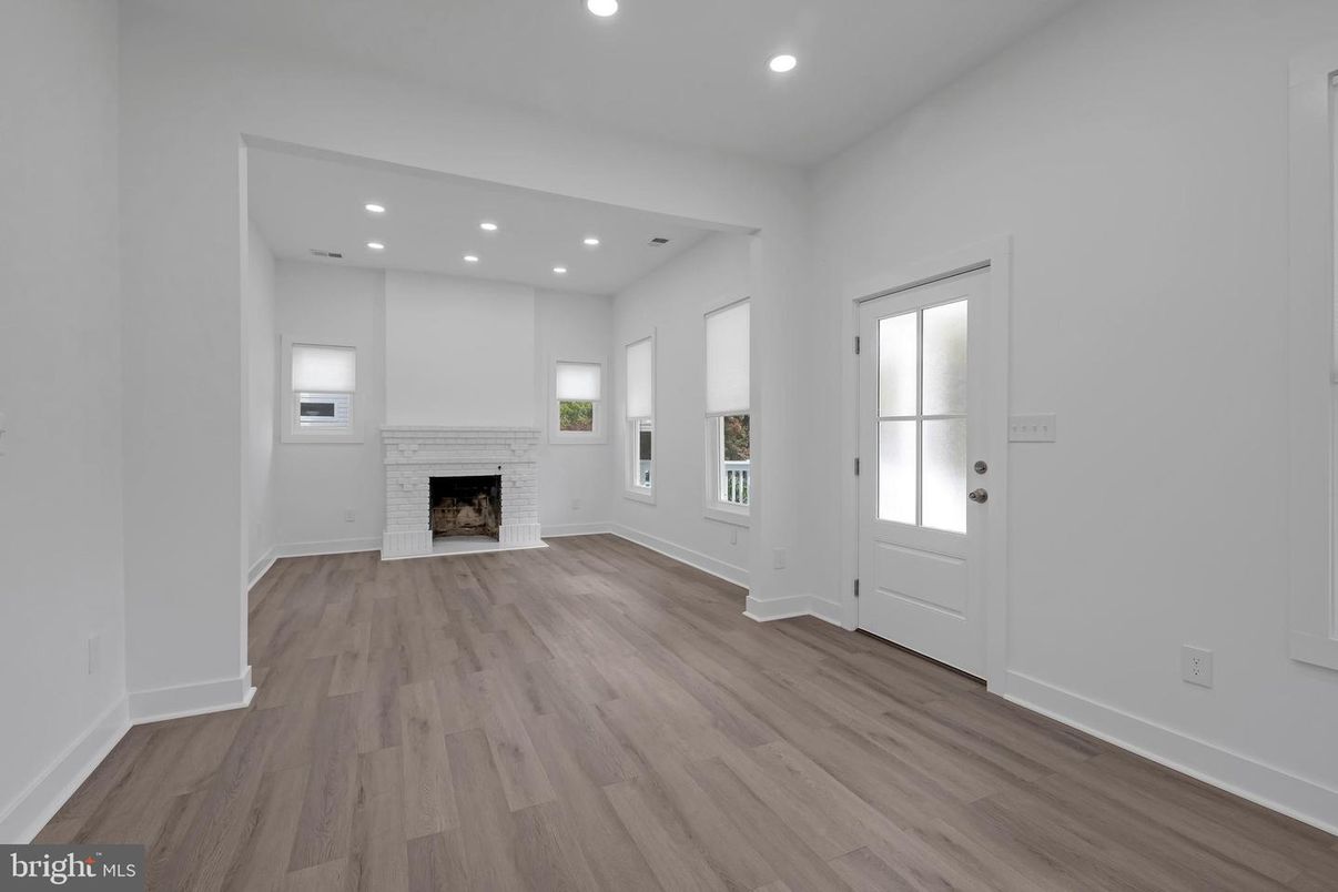 Empty room, Fireplace, Interior, Recessed Lighting, Wood Texture Flooring