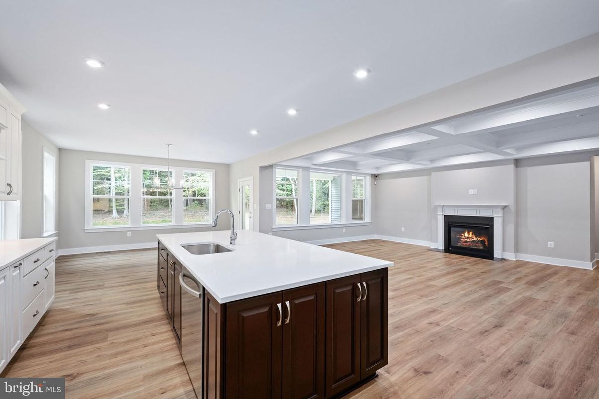 Empty room, Fireplace, Interior, Kitchen, Recessed Lighting, Wood Texture Flooring