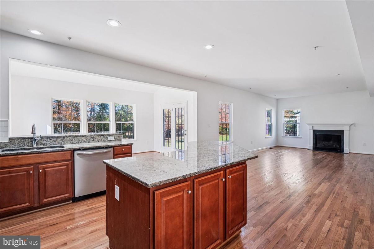 Fireplace, Interior, Kitchen, Recessed Lighting, Wood Texture Flooring
