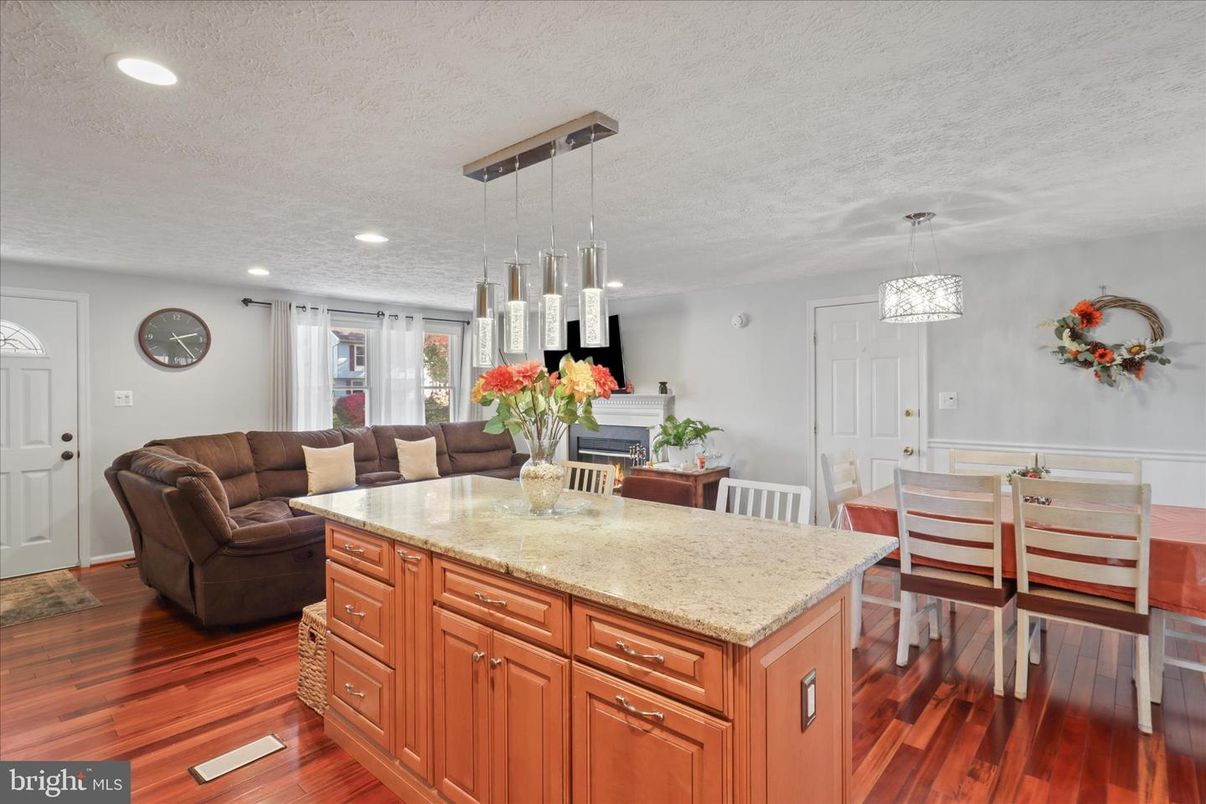 Dining room, Fireplace, Interior, Pendant Lights, Recessed Lighting, Wood Texture Flooring