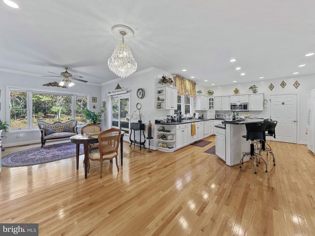 Chandelier, Dining room, Interior, Kitchen, Living room, Recessed Lighting, Wood Texture Flooring