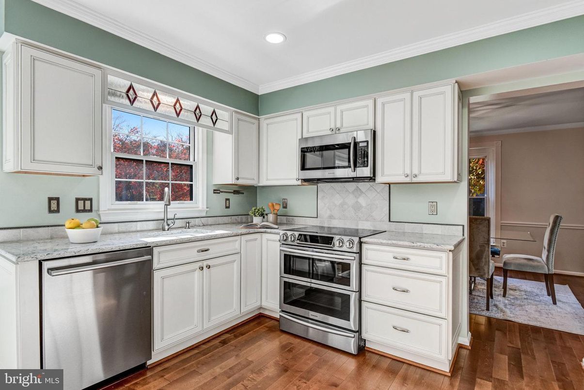 Dining room, Interior, Kitchen, Recessed Lighting, Stainless Steel Appliances, Wood Texture Flooring