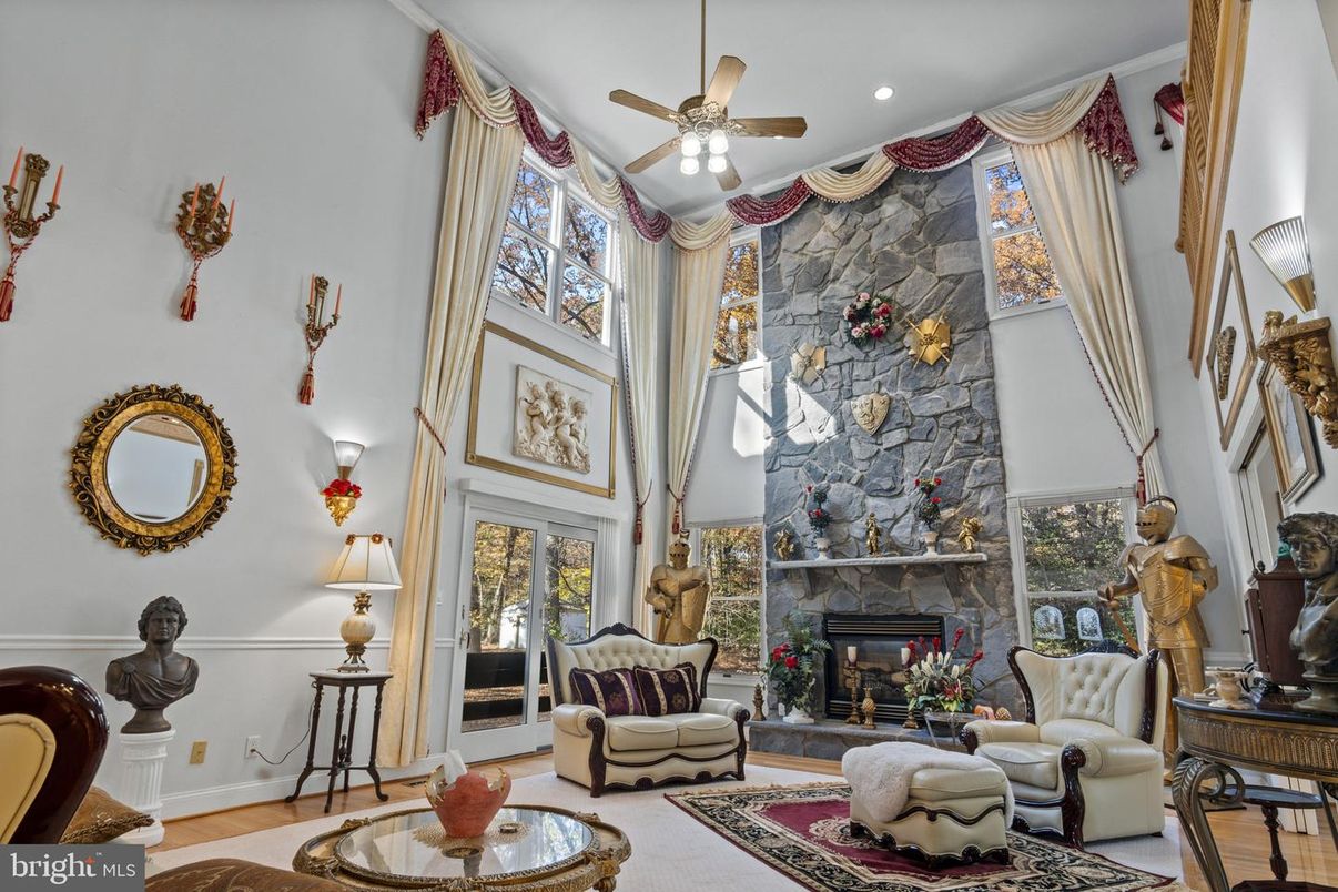 Fireplace, Interior, Living room, Recessed Lighting, Stone Walls, Wood Texture Flooring