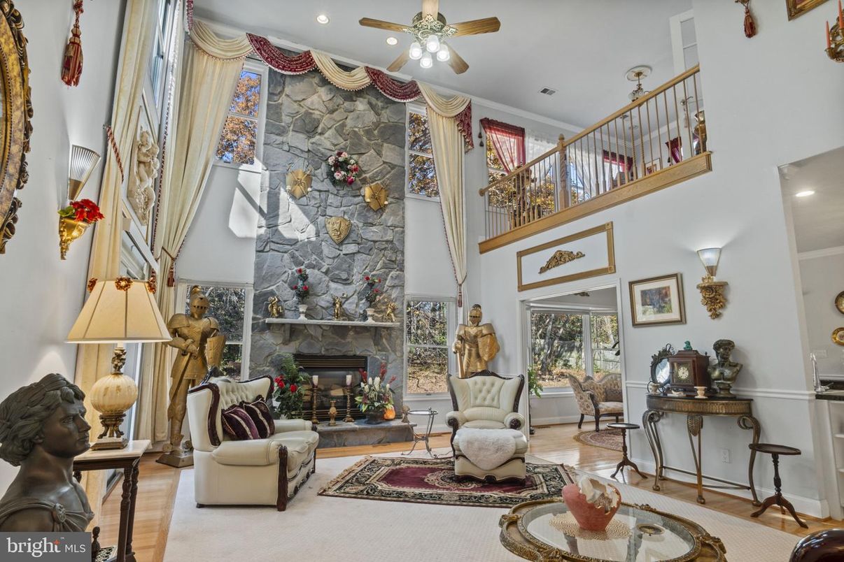 Fireplace, Interior, Living room, Recessed Lighting, Stone Walls, Wood Texture Flooring