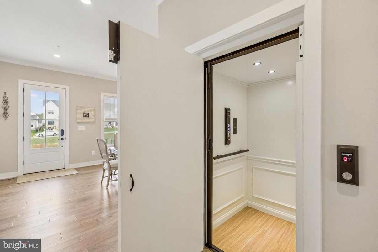 Elevator, Interior, Recessed Lighting, Wood Texture Flooring