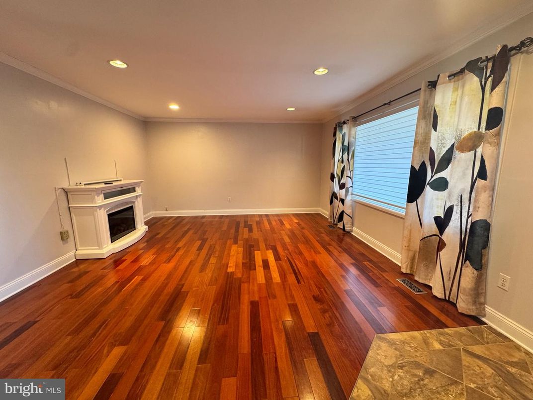 Empty room, Fireplace, Interior, Recessed Lighting, Wood Texture Flooring