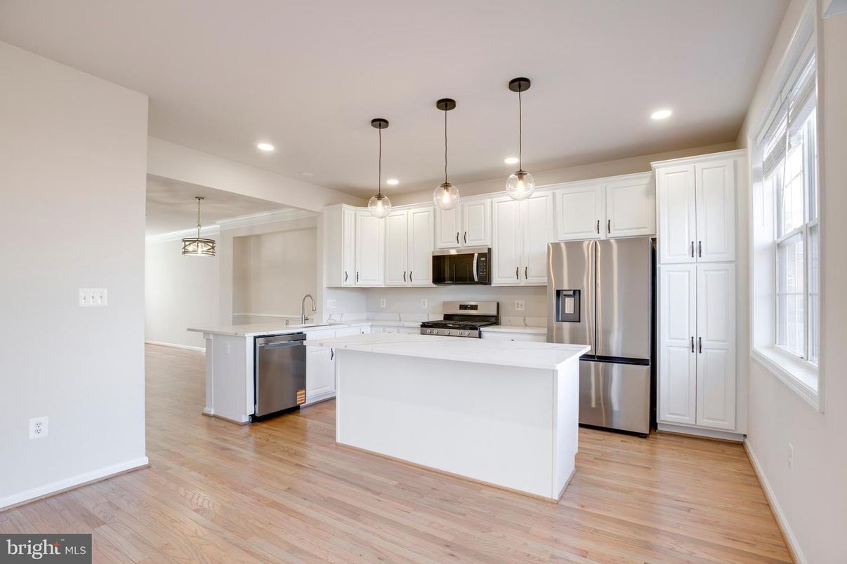 Interior, Kitchen, Pendant Lights, Recessed Lighting, Stainless Steel Appliances, Wood Texture Flooring