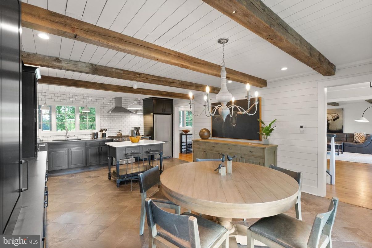 Chandelier, Dining room, Interior, Kitchen, Pendant Lights, Recessed Lighting, Stainless Steel Appliances, Wooden Beams, Wood Texture Flooring