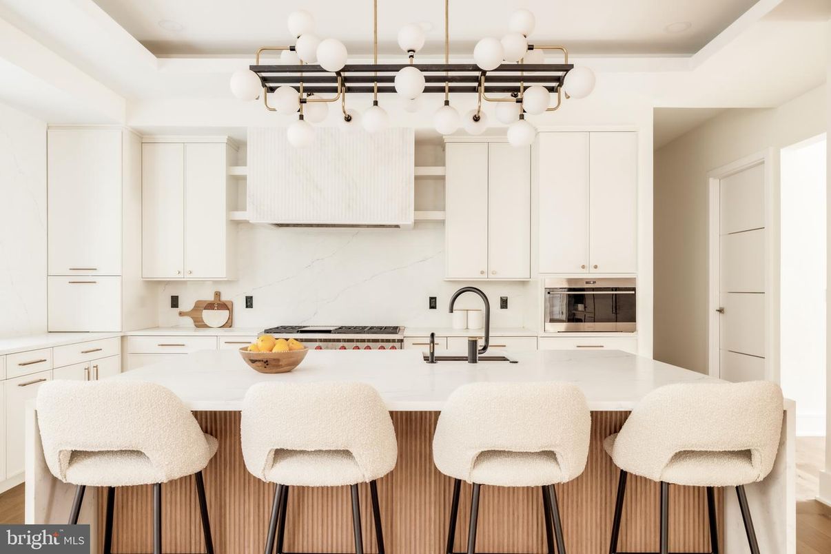 Interior, Kitchen, Marble Walls, Pendant Lights, Stainless Steel Appliances