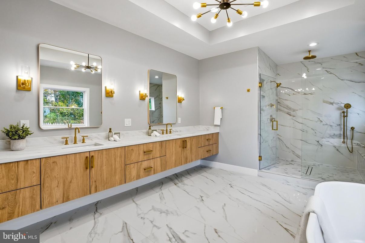 Bathroom, Dual Sink Vanities, Glass Shower, Interior, Marble, Marble Walls, Recessed Lighting