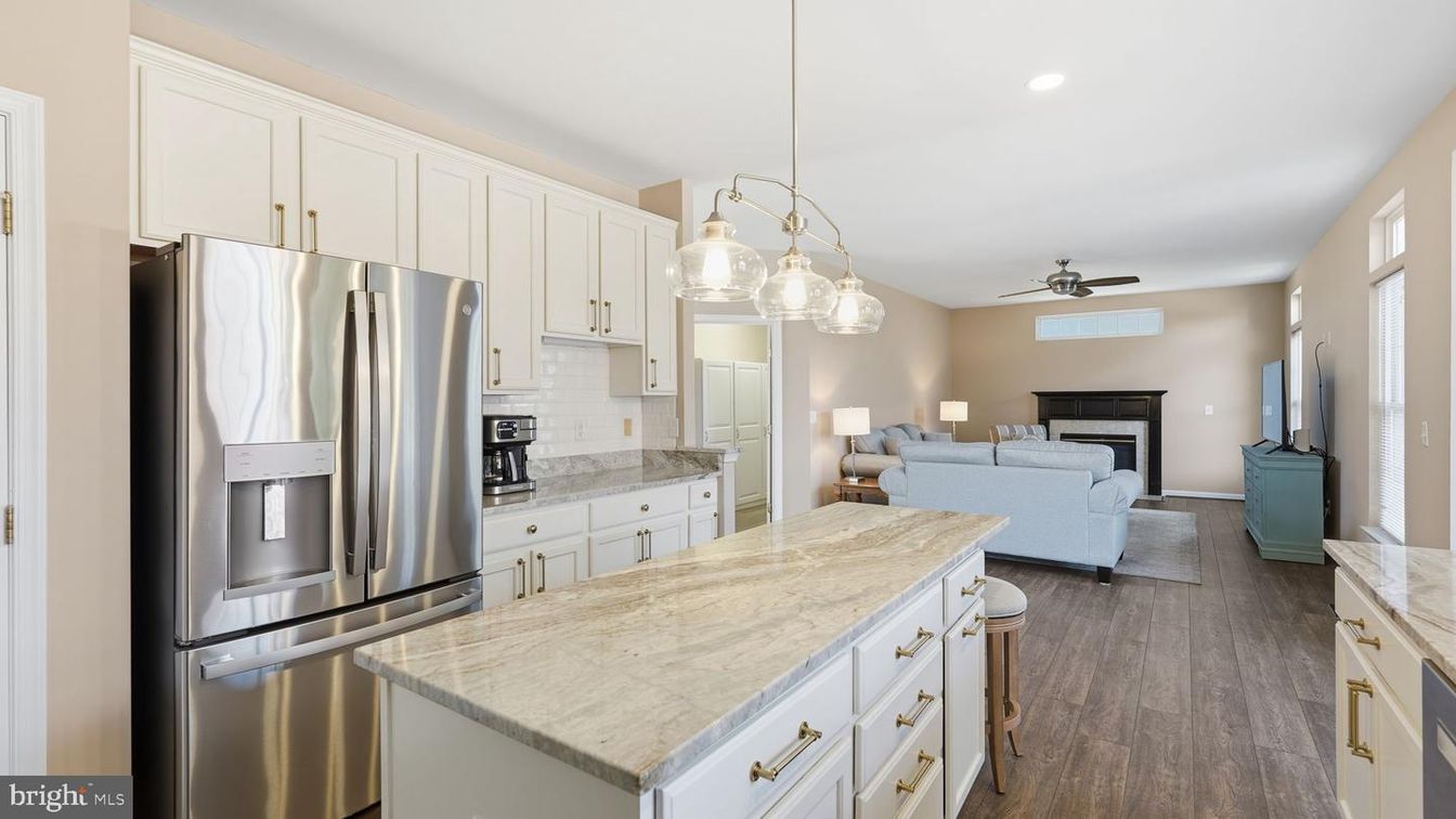 Fireplace, Interior, Kitchen, Living room, Pendant Lights, Recessed Lighting, Stainless Steel Appliances, Wood Texture Flooring