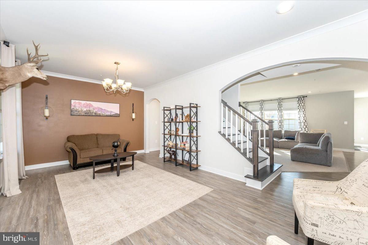 Chandelier, Interior, Living room, Recessed Lighting, Wood Texture Flooring