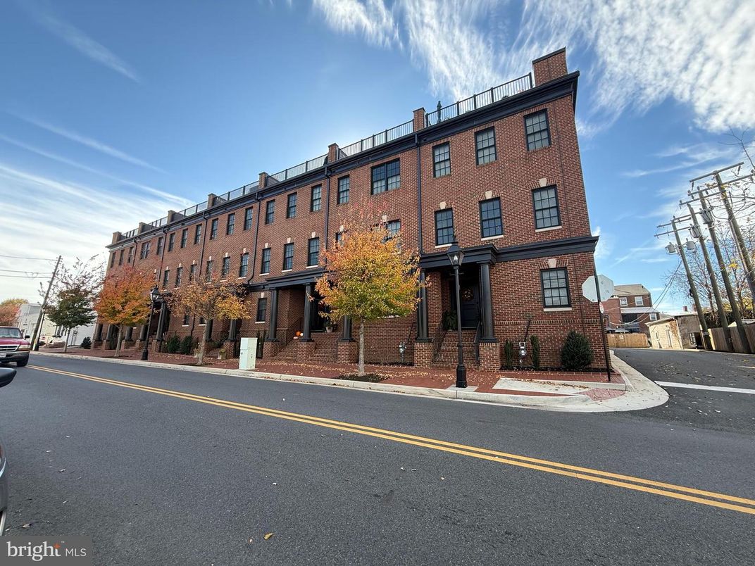 Exterior, Facade, Brick Facade, Condo Building