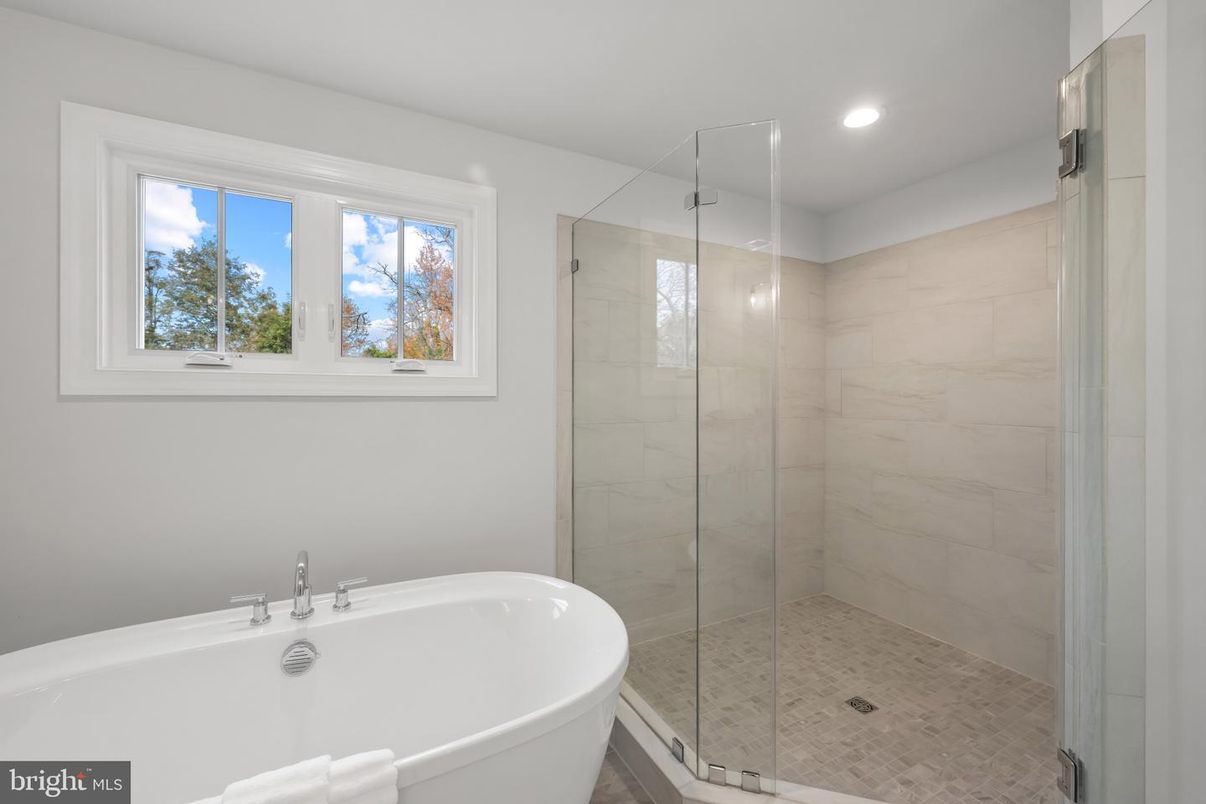 Bathroom, Free Standing Baths, Glass Shower, Interior, Marble Walls, Recessed Lighting