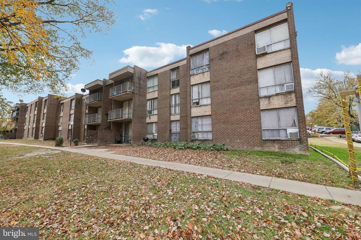 Exterior, Facade, Brick Facade, Condo Building