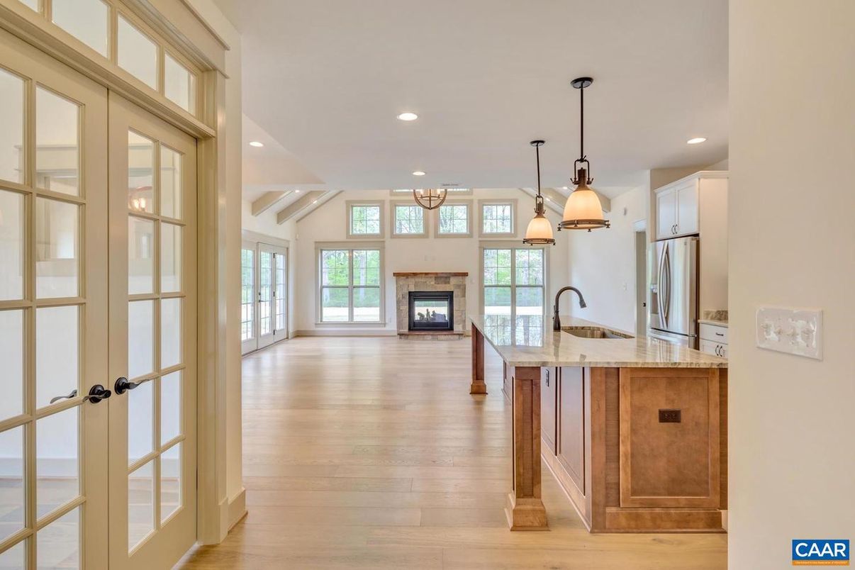 Chandelier, Fireplace, Interior, Kitchen, Pendant Lights, Recessed Lighting, Wood Texture Flooring