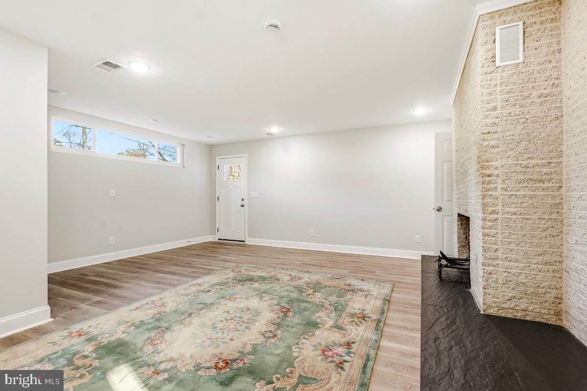Empty room, Fireplace, Interior, Recessed Lighting, Wood Texture Flooring